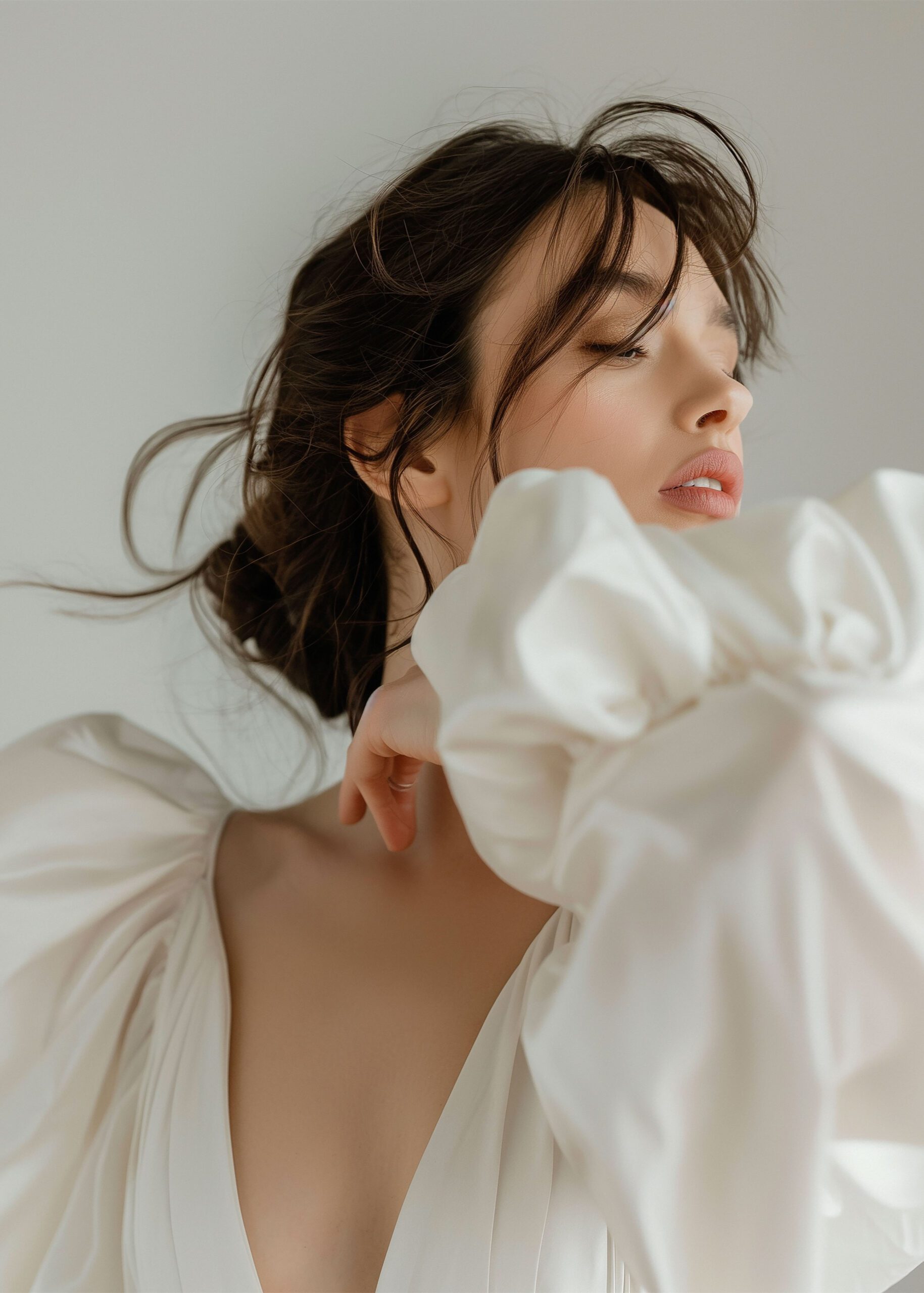 Image of woman in bridal dress looking away
